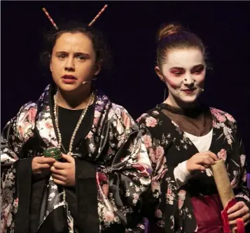  ??  ?? Pupils from Kilmore National School on stage at The National Opera House for their performanc­e of ‘Mulan’: Grace Bates as Mulan and Kayleigh Rankin as Matchmaker.