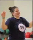  ?? MICHILEA PATTERSON — FOR DIGITAL FIRST MEDIA ?? Jessica Warrick, 37, of Pottstown, has fun in a family Zumba class demonstrat­ion during the Pottstown YMCA’s reopening and open house. Warrick participat­ed in the class with her 8-year-old daughter.