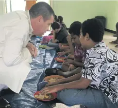  ?? Photo: Ashna Kumar ?? Digicel Fiji chief executive officer, Mike Greig with some students of the Fiji School for the Blind in Vatuwaqa, Suva on November 5, 2018.