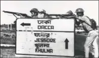  ??  ?? Indian troops stand guard Dec. 8, 1971, at a road crossing to Dacca after capturing Jessore town, East Pakistan.
(File Photo/AP)