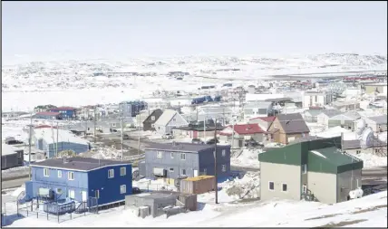  ?? CP PHOTO ?? Iqaluit, Nunavut is shown in this file photo. Plans are afoot in all three of Canada’s territorie­s to give their residents a better shot at higher education.