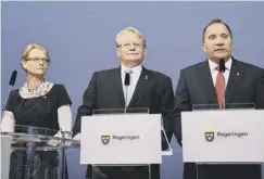  ??  ?? 0 Migration minister Helene Fritzon, defence minister Peter Hultqvist and prime minister Stefan Lofven yesterday