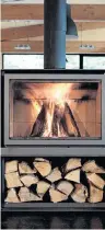  ??  ?? The STUV 16 wood-burning stove is capable of warming up to 2,100 square feet. As an optional extra, it can be installed onto a granite base.