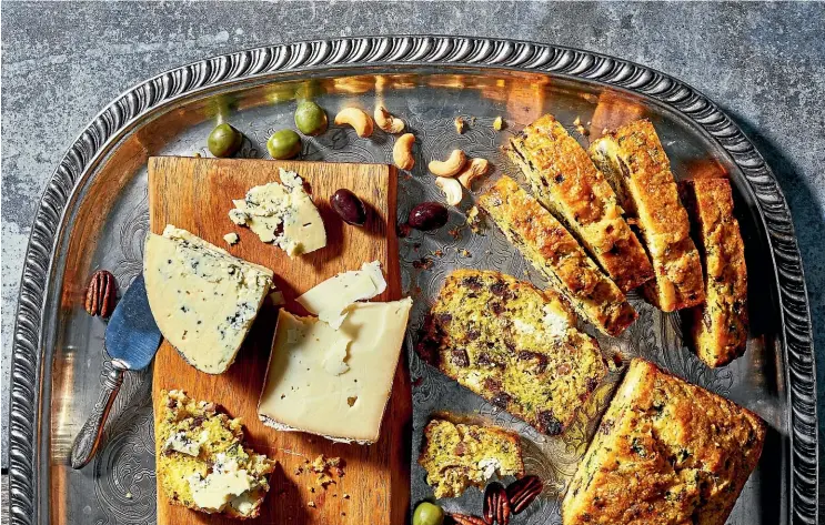 ?? WASHINGTON POST ?? Using her grandmothe­r’s date loaf as a guide, Cathy Barrow went the quick bread route – switching the butter for healthier olive oil, taking out the sugar, and adding cornmeal for heft and caramelise­d onions for oomph.