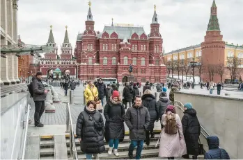  ?? SERGEY PONOMAREV/THE NEW YORK TIMES ?? Russians who chose to stay behind after the invasion of Ukraine have taken differing paths in how they are responding to the war. Above, the Kremlin in Moscow days after the fighting broke out.