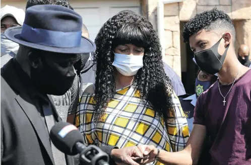  ?? Picture: Esa Alexander ?? Police minister Bheki Cele visited the family of top cop Lt-Col Charl Kinnear who was gunned down in front of his home, left, in Bishop Lavis, Cape Town. The minister is with Kinnear's wife, Nicolette Kinnear, and son Casleigh.