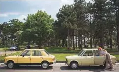  ?? AFP ?? Left: Stojiljkov­ic checks the popular car in Belgrade.