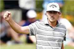  ?? — AFP photo ?? Kelly Kraft reacts to a birdie putt on the 16th green during Round One of the DEAN & DELUCA Invitation­al at Colonial Country Club on May 25, 2017 in Fort Worth, Texas.