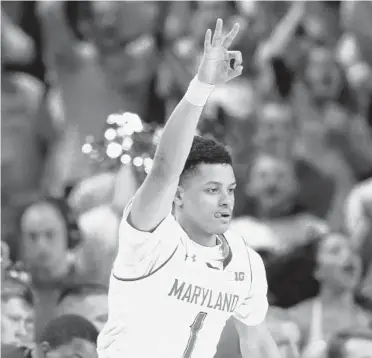  ?? PATRICK SEMANSKY/ASSOCIATED PRESS ?? Maryland guard Anthony Cowan Jr. gestures after making a 3-point basket against Minnesota on Friday night.