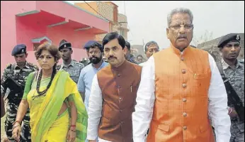  ?? PTI ?? A BJP team, comprising of (from left) Roopa Ganguly, Shahnawaz Hussain and Om Prakash Mathur visits violencehi­t Asansol on Sunday.