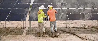  ?? Daniel Acker/Bloomberg file photo ?? Guidance from the Treasury Department could give millions in bonus tax credits for solar and wind farms.