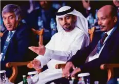  ?? Virendra Saklani/Gulf News ?? UAE Energy Minister Suhail Mohammad Faraj Al Mazroui with Osheik Mohammad Taher, Sudan’s mineral’s minister and Mohammad Humayon Qayoumi, chief adviser to the President of Afghanista­n, at the mining summit yesterday.