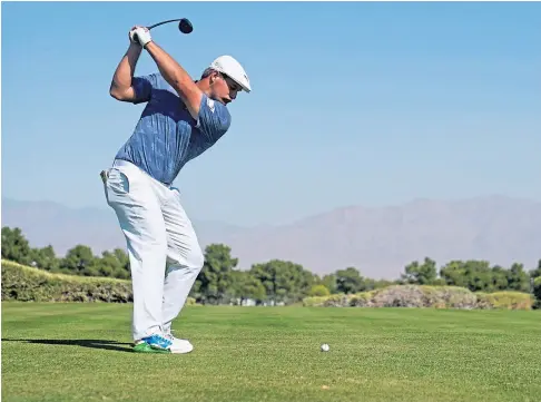  ??  ?? SUPER SCIENCE GENIUS: US Open champ Bryson DeChambeau is experiment­ing with a 48-inch shaft on his driver.