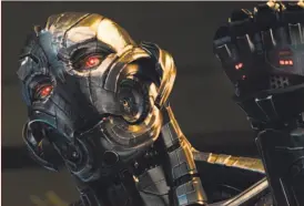  ?? Marvel Studios ?? Ultron ( James Spader) takes on Captain America, Iron Man, Black Widow and Thor in “Avengers: Age of Ultron.”