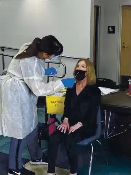  ?? PHOTO COURTESY OF SOLANA BEACH SCHOOL DISTRICT ?? A Solana Beach School District staff member is tested for COVID-19 in preparatio­n for district elementary schools reopening for in-person instructio­n.