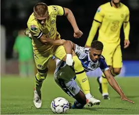  ?? ?? Bristol Rovers’ Zain Walker battles for the ball against Chelsea Under-21s