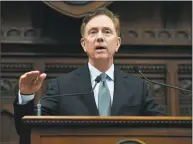  ?? Jessica Hill / Associated Press ?? Gov. Ned Lamont delivers his budget address at the State Capitol in Hartford on Feb. 20.