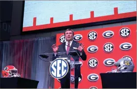  ?? KEN WARD / For the Calhoun Times ?? Georgia head coach Kirby Smart talks to the media during a press conference at SEC Media Days on Tuesday at the College Football Hall of Fame in Atlanta.