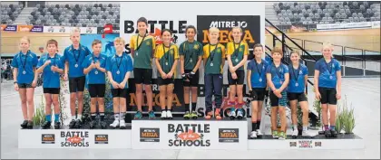  ?? Photo / Supplied ?? Cambridge Primary Blaze, Year 5-6 winners, at the Battle of the Schools track cycling event, flanked by second placed Goodwood Ferns (left) and third placed Leamington Rockets (right).