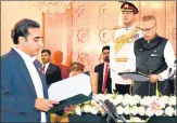  ?? AFP ?? President Arif Alvi (right) administer­ing the oath to Bilawal Bhutto Zardari in Islamabad, on Wednesday.