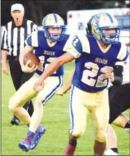  ?? Westside Eagle Observer/MIKE ECKELS ?? With Kevin Sanchez (22) running interferen­ce, Bulldog quarterbac­k Bryson Funk runs to the outside for a first down during the Decatur-Watts (Okla.) football game at Bulldog Stadium in Decatur Aug. 30. Watts handed Decatur its first defeat of the 2019 season, 60-24.