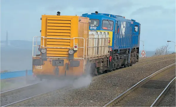  ?? Gordon Hawkins ?? NIR No.8112 in action hauling the waterjette­r through Holywood while working from Portadown to Bangor on November 17.