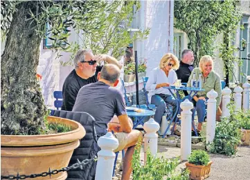  ?? ?? i Chelsea-on-Sea: The Tuscan Farm shop stocks extra virgin olive oil and organic Italian wine ‘Many businesses would go under without tourists as locals don’t shop in the village, they drive to Aldi’