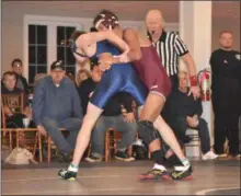  ?? BARRY TAGLIEBER — FOR DIGITAL FIRST MEDIA ?? Pottsgrove’s Matt Bechtel tries to bring down Pottstown’s Matthew Deppen during their bout at 126 pounds on Wednesday night during the Border Battle.