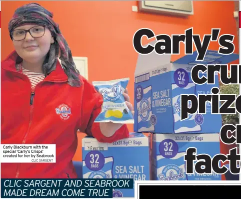  ??  ?? Carly Blackburn with the special ‘Carly’s Crisps’ created for her by SeabrookCL­IC SARGENT