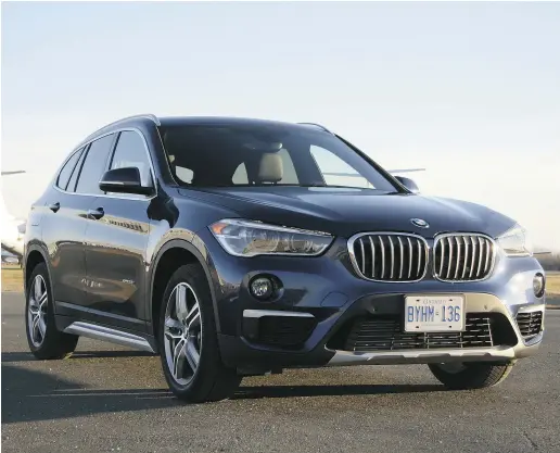  ?? Lesley Wimbush / Driving ?? The new 2016 BMW X1’s taller roofline and xLine-specific 18-inch wheels give it a definite crossover appearance.