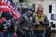  ?? JACQUELYN MARTIN — THE ASSOCIATED PRESS ?? People attend a rally at Freedom Plaza Tuesday, in Washington, in support of President Donald Trump.