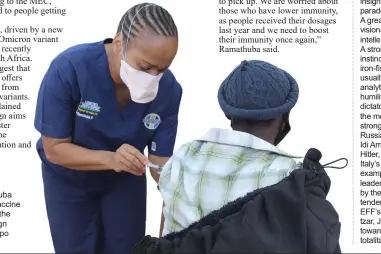  ?? ?? Health MEC
Phophi Ramathuba administer­s a vaccine injection during the booster campaign launch at Limpopo Mall last week.