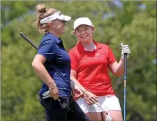  ?? MATT STONE — BOSTON HERALD ?? Jillian Johnson of Notre Dame Academy, left, and Piper Johnson of Hingham share a laugh during the South Sectional girls golf championsh­ip on Tuesday.