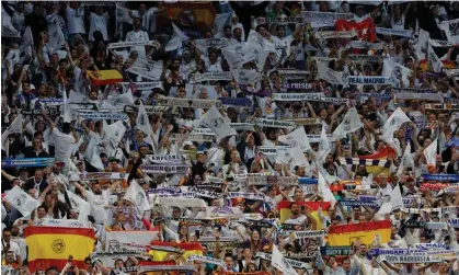  ?? ?? Real Madrid fans inside the Stade de France for last May’s Champions League final against Liverpool. Photograph: Tom Jenkins/The Guardian