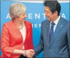  ??  ?? Theresa May meets with Japan PM Shinzo Abe at the G20 yesterday