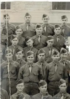  ??  ?? A SMILING Victor (second row center) during basic trainin