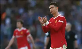  ?? Photograph: Bryn Lennon/Getty Images ?? Cristiano Ronaldo applauds the Manchester United fans during their 4-0 defeat to Brighton in May.