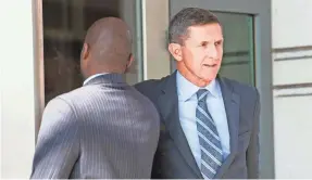  ??  ?? Over the weekend, the White House downplayed former national security adviser Michael Flynn’s pleading guilty to lying to the FBI and agreeing to cooperate with prosecutor­s. JACK GRUBER/USA TODAY