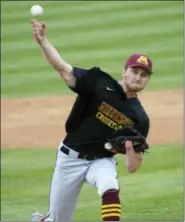  ?? TOM NELSON — ST. CLOUD STATE UNIVERSITY ATHLETIC MEDIA RELATIONS VIA AP ?? This photo provided by St. Cloud State University Athletic Media Relations, shows University of Minnesota-Crookston pitcher Parker Hanson pitching against Minnesota State during a college baseball game in St. Cloud, Minn.