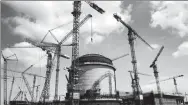  ??  ?? The Phase II project of the Fangchengg­ang Nuclear Power Plant isunderway in May. PROVIDED TO CHINA DAILY