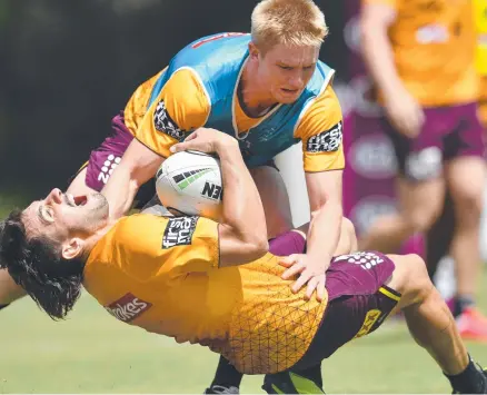  ?? Picture: Darren England/AAP ?? OH NO: Jack Bird reacts after being injured in a tackle by Tom Dearden during the Broncos’ training session at Brisbane’s Clive Berghofer Field yesterday.