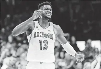  ?? CASEY SAPIO/USA TODAY SPORTS ?? Arizona forward Deandre Ayton impresses NBA scouts with his footwork and array of post moves.