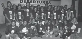  ??  ?? The group of Zimbabwean­s who attended the Carling Black Label Cup soccer match between Soweto giants Kaizer Chiefs and Orlando Pirates at FNB Stadium yesterday