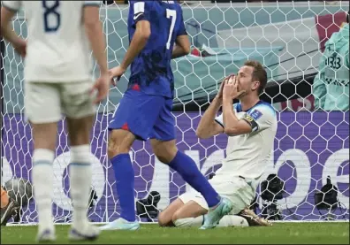  ?? (AP/Abbie Parr) ?? England’s Harry Kane (right) reacts Friday after missing a chance to score during a 0-0 draw against the United States in Group B action at the FIFA World Cup in Al Khor, Qatar.