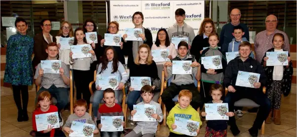  ??  ?? The prizewinne­rs in the year’s Wexford Credit Union Art Competitio­n, pictured with Angela Rice, Brigitte McLoughlin, and Jos O’Connor of Wexford Credit Union, and John Roche, Child Liaison Officer.