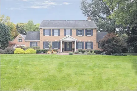  ?? Photos by Jon Mansberger ?? The brick Colonial at 108 Lower Newtown Road, Halfmoon, is 4,000 square feet. At left is the sunroom.