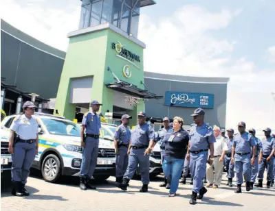  ?? ?? King Cetshwayo District SAPS management and officers conducting patrols at shopping malls in Richards Bay