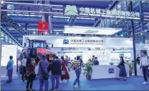  ?? PROVIDED TO CHINA DAILY ?? Visitors gather at China National Machinery Industry Corp’s booth during an expo in Shenzhen, Guangdong province, in November.