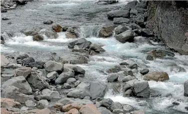  ?? PHOTO: ROSS SETFORD/NZPA ?? In New Zealand, water just falls out of the sky. It’s easy to be blase about a raw product that occurs so easily.