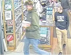  ?? AFP ?? This screen grab shows missing Belgian tourist Theo Hayez, right, in a liquor store in the coastal tourist town of Byron Bay, Australia last month.
